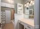 A bathroom featuring tiled floors, a shower and separate vanity area at 1173 Cat Square Rd, Vale, NC 28168