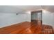 Bedroom with hardwood floors, neutral walls, and closet storage space at 1173 Cat Square Rd, Vale, NC 28168