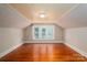 Spacious bedroom featuring wood floors and three windows offering natural light at 1173 Cat Square Rd, Vale, NC 28168