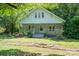 Charming cottage-style home with a welcoming front porch and a well-maintained front yard at 1173 Cat Square Rd, Vale, NC 28168