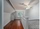 Bright hallway with hardwood floors and access to upper level at 1173 Cat Square Rd, Vale, NC 28168