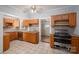 Functional kitchen featuring wood cabinets, stainless steel appliances, and tiled flooring at 1173 Cat Square Rd, Vale, NC 28168