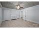 Spacious living area with tile flooring and unique ceiling detail at 1173 Cat Square Rd, Vale, NC 28168