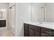 This bathroom features neutral walls, tile floor, vanity, shower and tub combination at 1281 Arges River Dr, Fort Mill, SC 29715