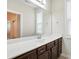 This bathroom features neutral walls, a tile floor, vanity, and an extra long mirror at 1281 Arges River Dr, Fort Mill, SC 29715