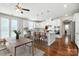 Modern eat-in kitchen with white cabinets, granite countertops and stainless steel appliances at 1281 Arges River Dr, Fort Mill, SC 29715