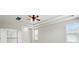 This main bedroom features neutral walls, carpeted floors, lots of natural light, and a tray ceiling with ceiling fan at 1281 Arges River Dr, Fort Mill, SC 29715