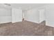 Large bonus room with neutral carpet and recessed lighting, offering flexible space at 1516 Respect Nw St, Concord, NC 28027