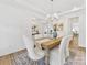 Inviting dining room with natural light, a stylish chandelier, and comfortable seating for Gathering meals at 1516 Respect Nw St, Concord, NC 28027