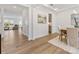 Bright and airy dining area showcasing an open floor plan and stylish wood flooring at 1516 Respect Nw St, Concord, NC 28027