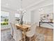 Inviting dining room with natural light, a stylish chandelier, and comfortable seating for Gathering meals at 1516 Respect Nw St, Concord, NC 28027