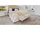 Elegant main bedroom with natural light, neutral decor, and comfortable furnishings at 1516 Respect Nw St, Concord, NC 28027
