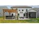 Outdoor patio featuring a hot tub, pergola, and a screened-in porch at 154 Cotton Field Dr, Statesville, NC 28677
