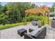 Relaxing backyard patio with hot tub, pergola and patio furniture for outdoor enjoyment and entertaining at 154 Cotton Field Dr, Statesville, NC 28677