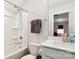 Cozy bathroom featuring shower-tub combo, single vanity, and neutral color palette at 154 Cotton Field Dr, Statesville, NC 28677