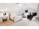 Bedroom with carpet, desk, and white tufted headboard at 154 Cotton Field Dr, Statesville, NC 28677