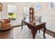 Bright home office with large windows, hardwood floors, classic desk, and neutral decor at 154 Cotton Field Dr, Statesville, NC 28677