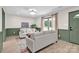 Comfortable living room with neutral tones, modern lighting, and stylish decor creating a warm and inviting atmosphere at 172 Wildwood Loop, Statesville, NC 28625