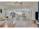 Open-concept living space featuring a spacious kitchen and a cozy living room with hardwood floors at 1916 Bess Town Rd, Bessemer City, NC 28016