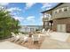 Backyard area with fire pit, chairs, and lake views at 216 Grand View Dr, New London, NC 28127