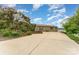 Lovely single-story home with spacious driveway and manicured front yard near the lake at 216 Grand View Dr, New London, NC 28127