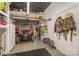 Spacious garage offering plenty of storage, a utility vehicle and workspace for hobbies and projects at 216 Grand View Dr, New London, NC 28127