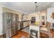 Spacious kitchen featuring granite countertops, stainless steel appliances, and a breakfast bar with stylish seating at 216 Grand View Dr, New London, NC 28127