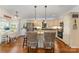 Bright and airy kitchen boasting granite countertops, stainless steel appliances, and a charming breakfast nook at 216 Grand View Dr, New London, NC 28127