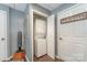 Efficient laundry area featuring a stacked washer and dryer, maximizing space in a compact layout at 216 Grand View Dr, New London, NC 28127