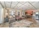 Expansive living room with stylish furnishings and bar area, ideal for hosting and relaxation at 216 Grand View Dr, New London, NC 28127