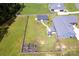 An aerial shot of a home with a long yard enclosed by a wood fence and a detached garage at 307 Stoneyard Rd, Richfield, NC 28137
