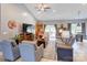 Inviting living room with vaulted ceilings, comfortable seating, and a seamless flow to the outdoors at 307 Stoneyard Rd, Richfield, NC 28137
