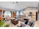 Cozy living room with modern decor, vaulted ceilings, hardwood floors and abundant natural light at 307 Stoneyard Rd, Richfield, NC 28137
