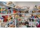 Walk-in pantry with organized shelving, stocked with an abundance of food and supplies for a large Gathering at 307 Stoneyard Rd, Richfield, NC 28137