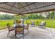 Outdoor patio with grill, dining table and chairs with covered gazebo and backyard at 307 Stoneyard Rd, Richfield, NC 28137