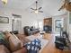 Cozy living room with hardwood floors, fireplace, and comfortable seating at 3206 Basilwood Cir, Monroe, NC 28110