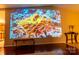 Entertain in this media room featuring a large projector screen and hardwood floors at 3711 Davis Dr, Charlotte, NC 28270