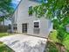 Backyard featuring a concrete patio and white siding on the house at 3830 Brookchase Ln, Charlotte, NC 28205