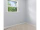 Bright bedroom with neutral walls and large window offering a pleasant view at 408 Kennerly Dr, Indian Trail, NC 28079