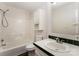 Well-lit bathroom features a shower-tub combo and a single sink vanity with storage at 508 Bridgestone Ln, Rock Hill, SC 29730
