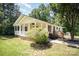 Charming single-story home with a cozy front porch, landscaped yard, and traditional architecture at 508 Bridgestone Ln, Rock Hill, SC 29730