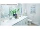 Well-lit bathroom with double sinks, modern fixtures, and stylish decor at 513 Jacobus Ln, Monroe, NC 28112