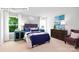 Comfortable bedroom with large windows, a plush bed, and stylish furnishings at 513 Jacobus Ln, Monroe, NC 28112