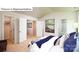 Primary bedroom with large closets, ensuite bathroom, and neutral carpeting at 513 Jacobus Ln, Monroe, NC 28112