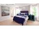 Cozy bedroom with large windows, and decorative furniture and neutral carpeting at 513 Jacobus Ln, Monroe, NC 28112