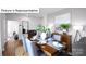 A stylish dining room with a wooden table, chairs, and decorative accents at 513 Jacobus Ln, Monroe, NC 28112