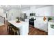 A modern kitchen with white cabinets, stainless steel appliances, and a center island at 513 Jacobus Ln, Monroe, NC 28112