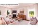 Bright living room with fireplace, stylish furniture, and natural light at 513 Jacobus Ln, Monroe, NC 28112