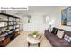 Open loft living area with comfortable seating, neutral color palette, and ample natural light at 513 Jacobus Ln, Monroe, NC 28112