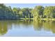 Scenic view of the peaceful lake, offering a serene and tranquil environment at 551 Sand Trap Dr, York, SC 29745